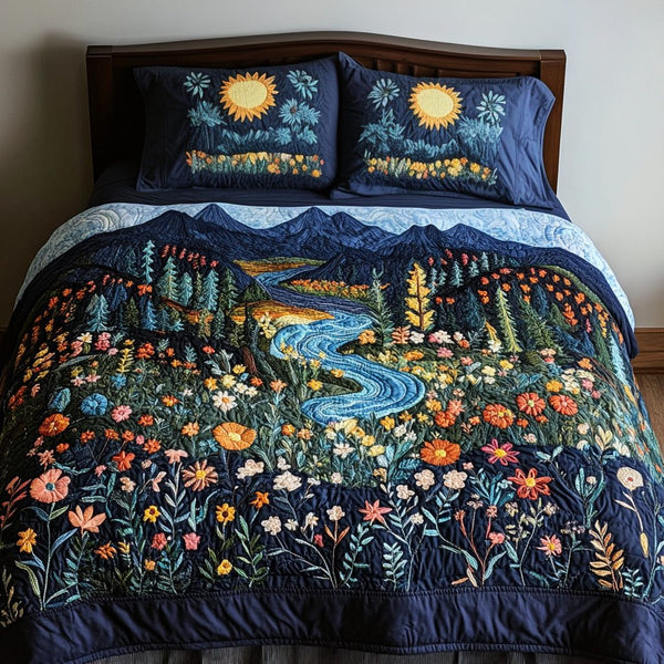 Mountain Stream quilted 3-piece bedding set on a made bed with two matching pillow shams