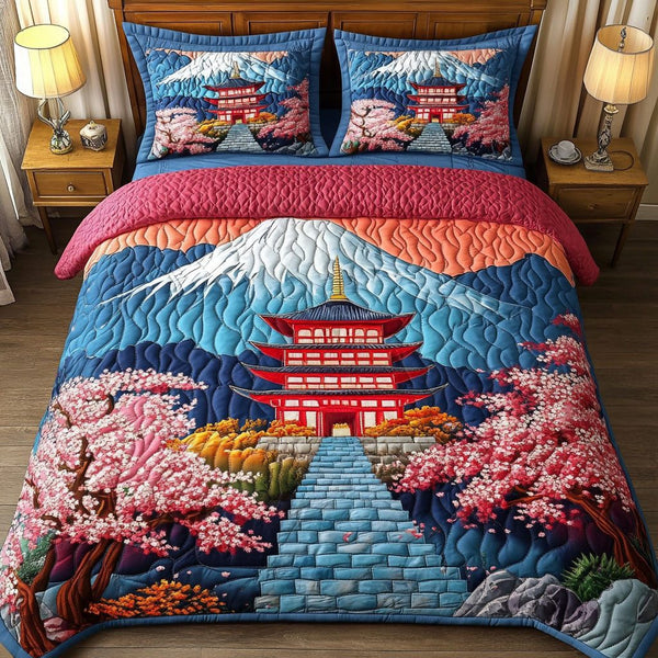 Mountain View quilted 3-piece bedding set on a made bed with two matching pillow shams