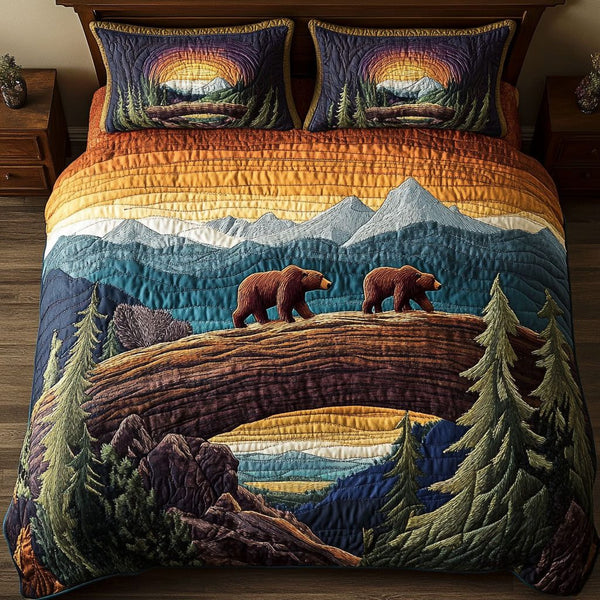 Mountain Walkers quilted 3-piece bedding set on a made bed with two matching pillow shams