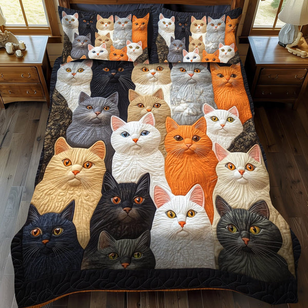 Multicolored Cats quilted 3-piece bedding set on a made bed with two matching pillow shams