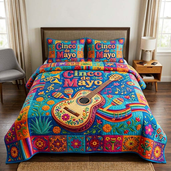 Music Fiesta quilted 3-piece bedding set on a made bed with two matching pillow shams