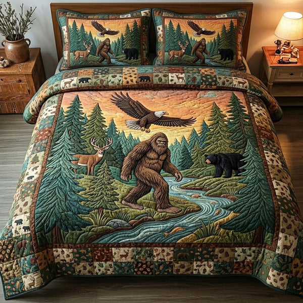 Mystic Bigfoot quilted 3-piece bedding set on a made bed with two matching pillow shams