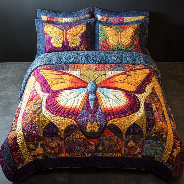 Mystic Butterfly quilted 3-piece bedding set on a made bed with two matching pillow shams