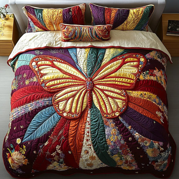 Mystic Butterfly quilted 3-piece bedding set on a made bed with two matching pillow shams