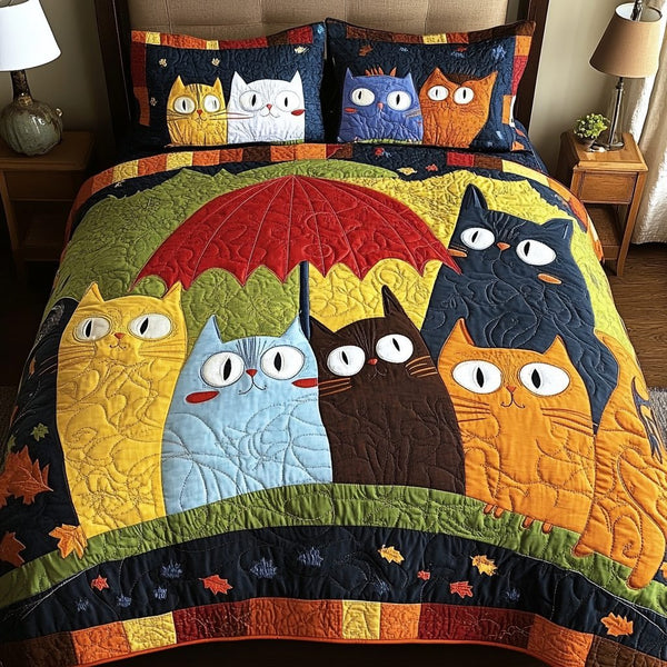 Mystic Cat quilted 3-piece bedding set on a made bed with two matching pillow shams