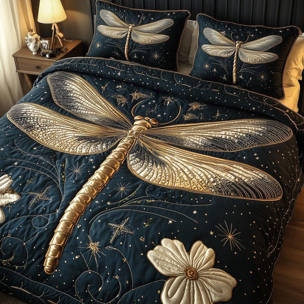 Mystic Dragonfly quilted 3-piece bedding set on a made bed with two matching pillow shams