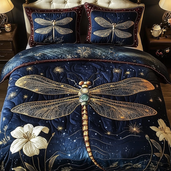 Mystic Dragonfly quilted 3-piece bedding set on a made bed with two matching pillow shams