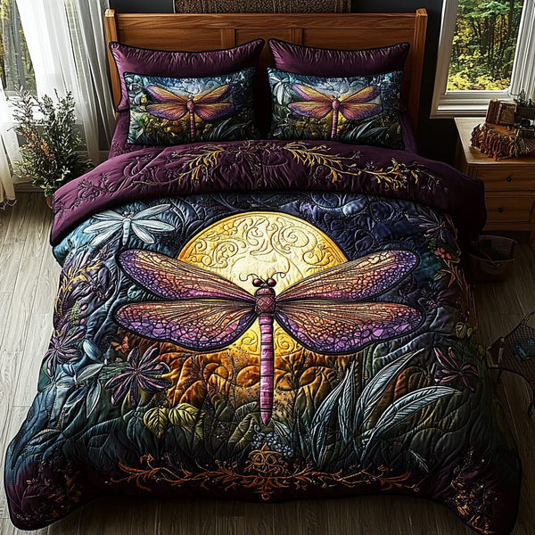Mystic Dragonfly quilted 3-piece bedding set on a made bed with two matching pillow shams