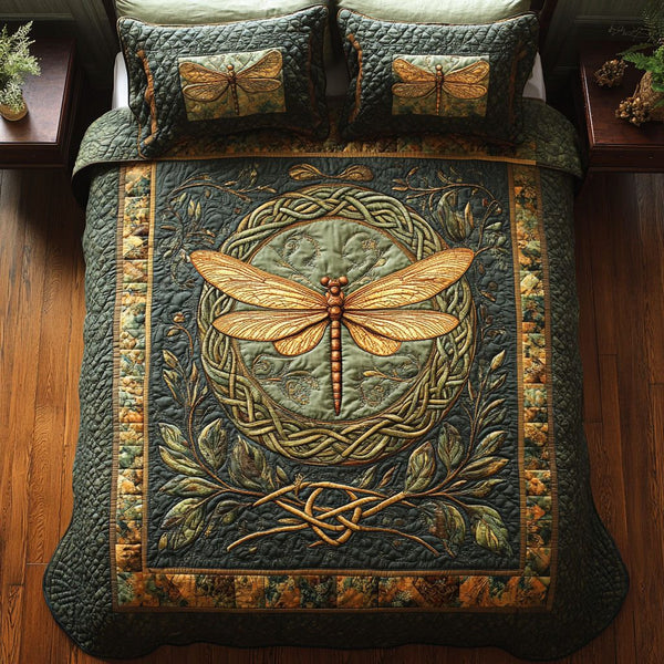 Mystic Dragonfly quilted 3-piece bedding set on a made bed with two matching pillow shams