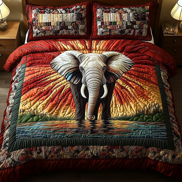 Mystic Elephant quilted 3-piece bedding set on a made bed with two matching pillow shams