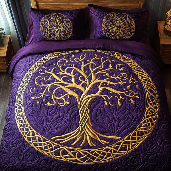 Mystic Forest Slumber quilted 3-piece bedding set on a made bed with two matching pillow shams