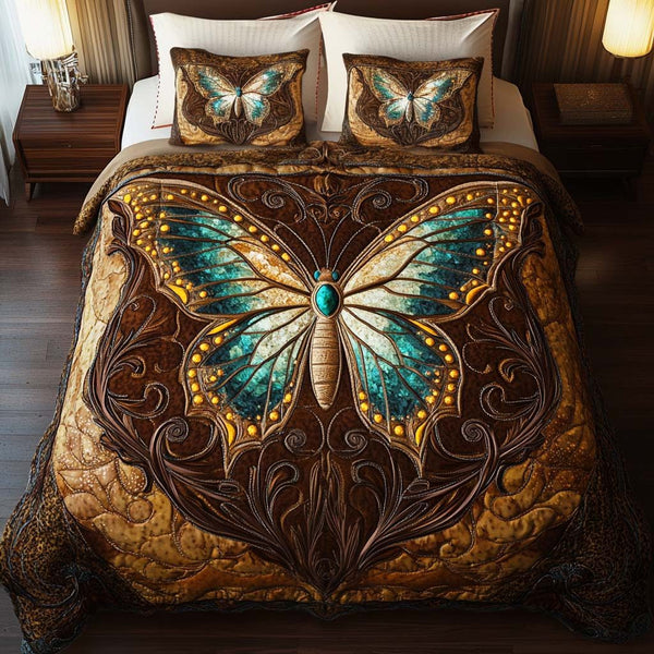 Mystic Glow quilted 3-piece bedding set on a made bed with two matching pillow shams