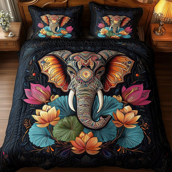 Mystic Lotus Elephant quilted 3-piece bedding set on a made bed with two matching pillow shams
