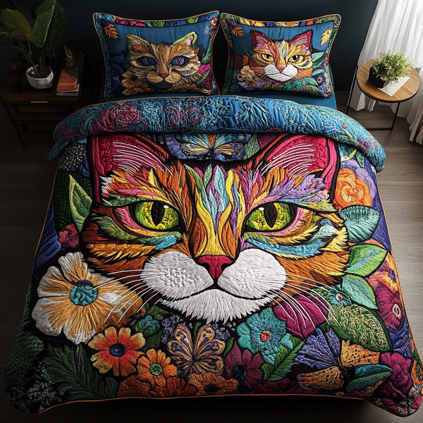 Mystic Meow quilted 3-piece bedding set on a made bed with two matching pillow shams