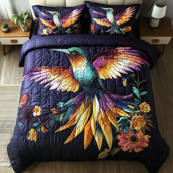 Mystic Nightbird quilted 3-piece bedding set on a made bed with two matching pillow shams