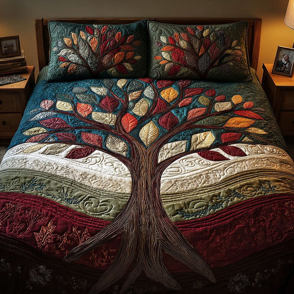 Mystic Roots quilted 3-piece bedding set on a made bed with two matching pillow shams
