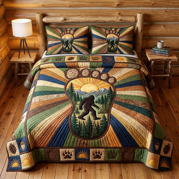 Mystic Sasquatch quilted 3-piece bedding set on a made bed with two matching pillow shams