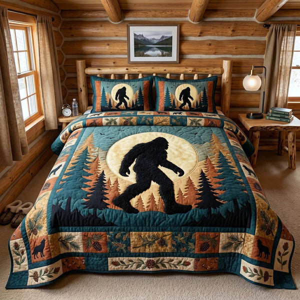 Mystic Sasquatch quilted 3-piece bedding set on a made bed with two matching pillow shams