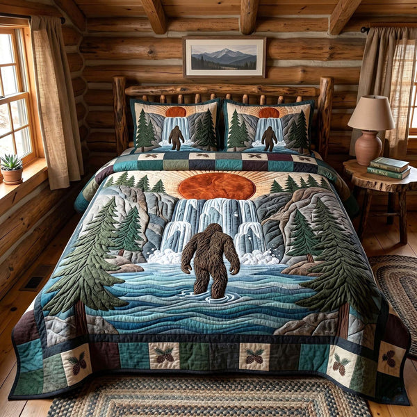 Mystic Sasquatch quilted 3-piece bedding set on a made bed with two matching pillow shams