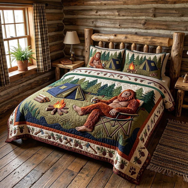 Mystic Sasquatch quilted 3-piece bedding set on a made bed with two matching pillow shams