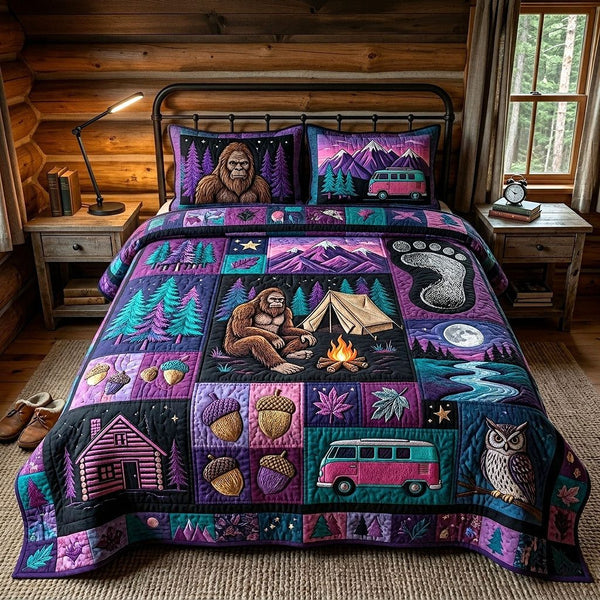 Mystic Sasquatch quilted 3-piece bedding set on a made bed with two matching pillow shams