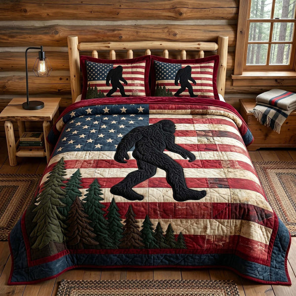 Mystic Sasquatch quilted 3-piece bedding set on a made bed with two matching pillow shams