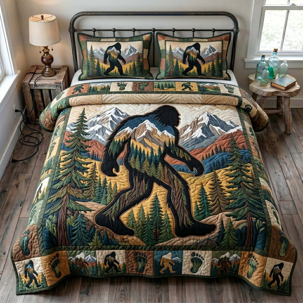 Mystic Sasquatch quilted 3-piece bedding set on a made bed with two matching pillow shams