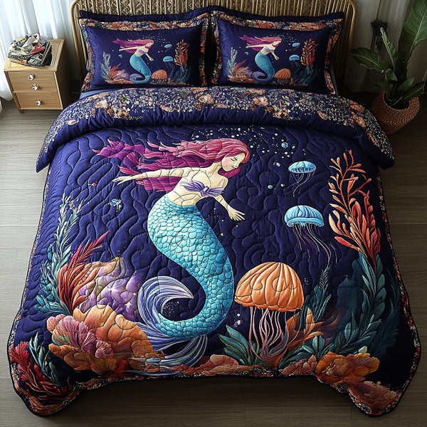Mystic Siren quilted 3-piece bedding set on a made bed with two matching pillow shams