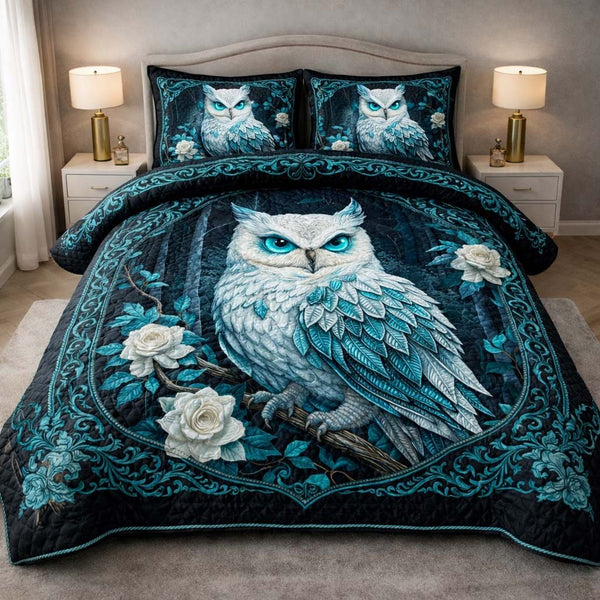 Mystic Teal Owl quilted 3-piece bedding set on a made bed with two matching pillow shams