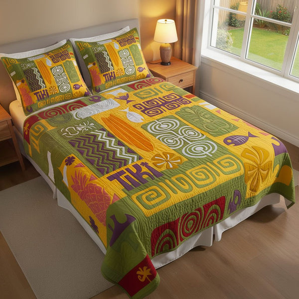 Mystic Tiki Retreat quilted 3-piece bedding set on a made bed with two matching pillow shams
