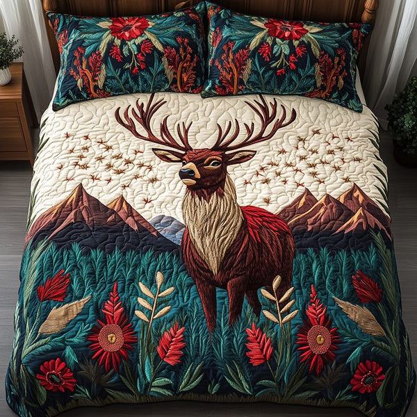 Mystic Trails quilted 3-piece bedding set on a made bed with two matching pillow shams