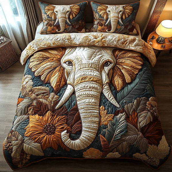 Mystic Tusk quilted 3-piece bedding set on a made bed with two matching pillow shams