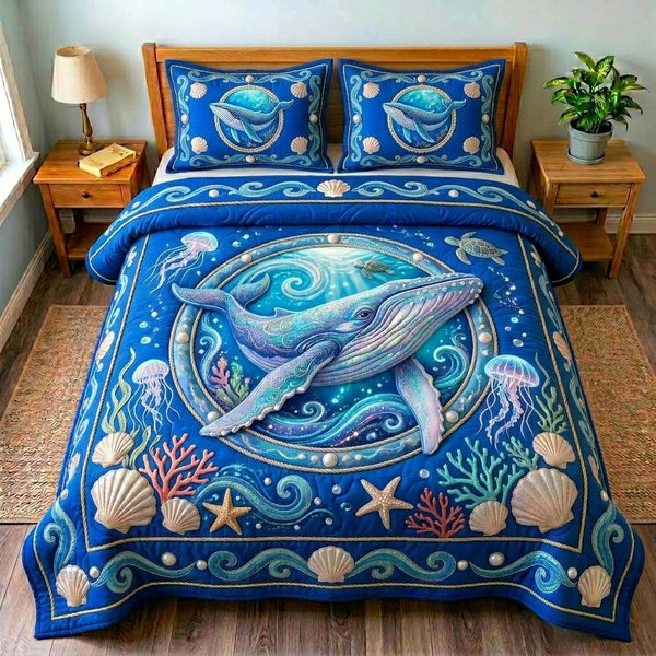 Mystic Whale Ocean quilted 3-piece bedding set on a made bed in a light coastal bedroom