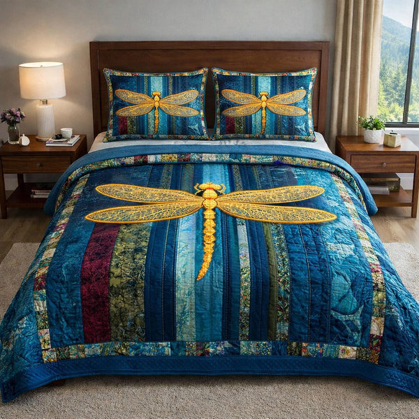 Mystic Wings quilted 3-piece bedding set on a made bed with two matching pillow shams