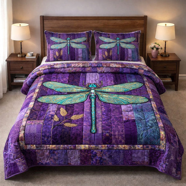 Mystic Wings quilted 3-piece bedding set on a made bed with two matching pillow shams