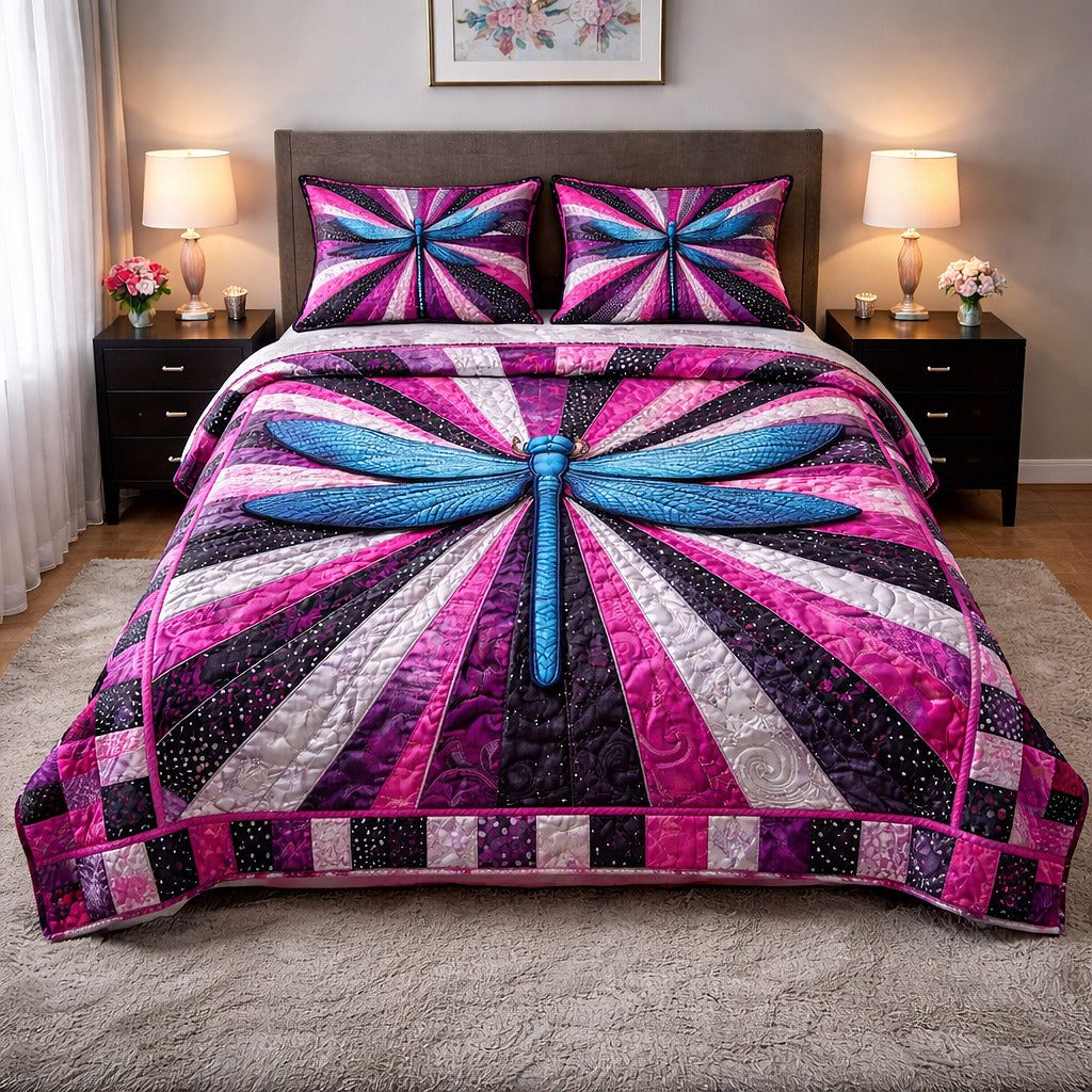 Mystic Wings quilted 3-piece bedding set on a made bed with two matching pillow shams