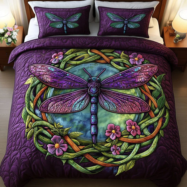 Mystic Wings quilted 3-piece bedding set on a made bed with two matching pillow shams