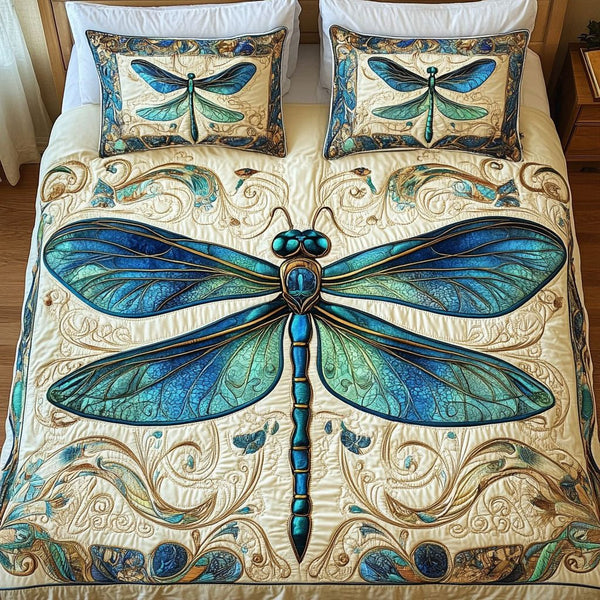 Mystic Wings quilted 3-piece bedding set on a made bed with two matching pillow shams