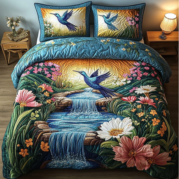 Mystic Wings quilted 3-piece bedding set on a made bed with two matching pillow shams