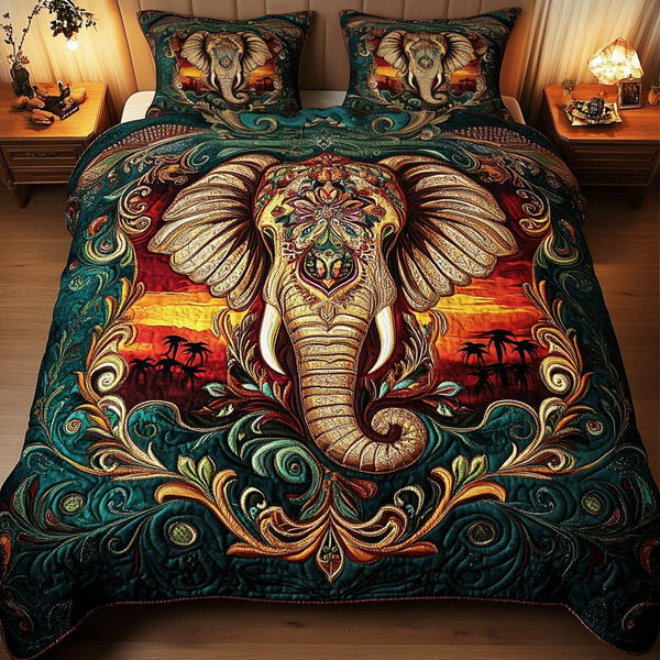 Mystical Elephant quilted 3-piece bedding set on a made bed with two matching pillow shams