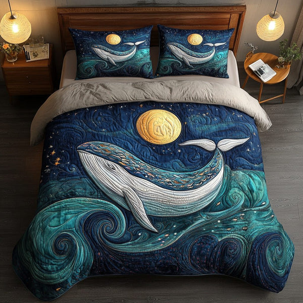 Mystical Midnight Whale quilted 3-piece bedding set on a made bed in a light coastal bedroom