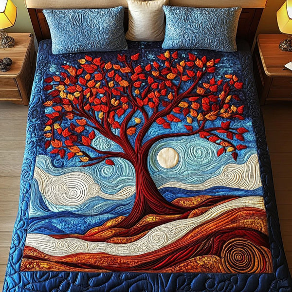 Mystical Tree quilted 3-piece bedding set on a made bed with two matching pillow shams