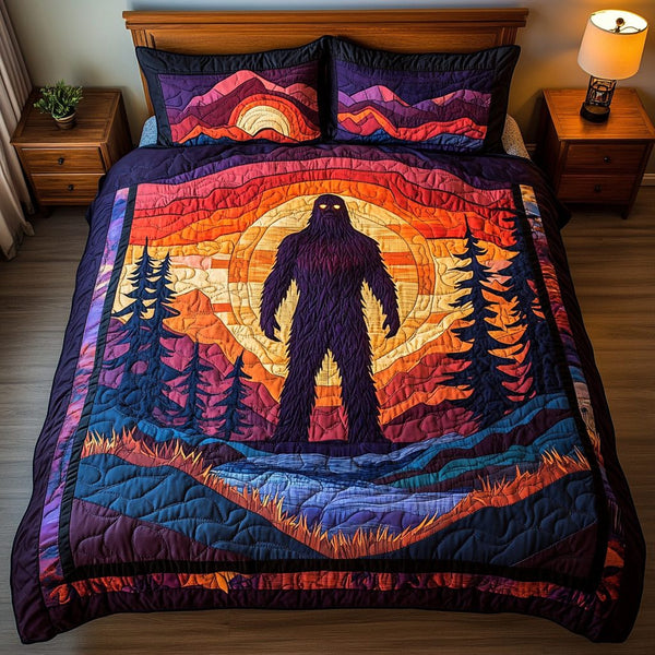 Mythic Stomp quilted 3-piece bedding set on a made bed with two matching pillow shams