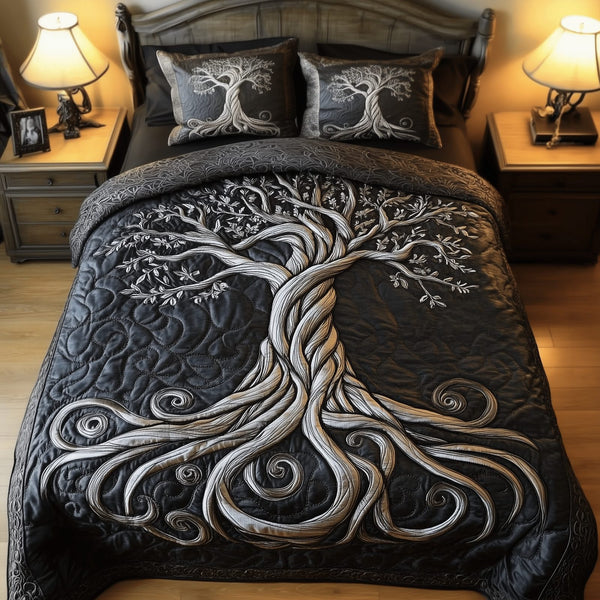 Mythic Tree of Life quilted 3-piece bedding set on a made bed with two matching pillow shams