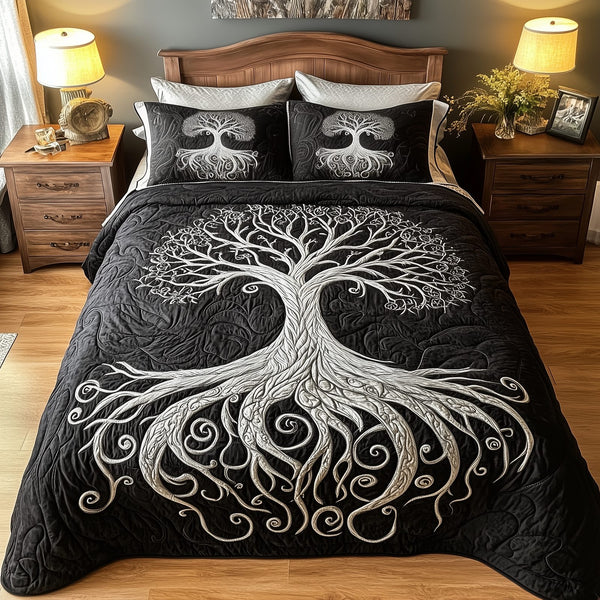Mythic Tree of Life quilted 3-piece bedding set on a made bed with two matching pillow shams