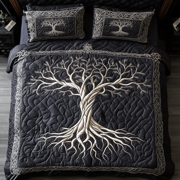 Mythic Tree of Life quilted 3-piece bedding set on a made bed with two matching pillow shams