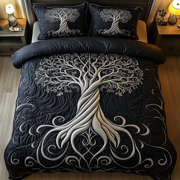 Mythic Tree of Life quilted 3-piece bedding set on a made bed with two matching pillow shams
