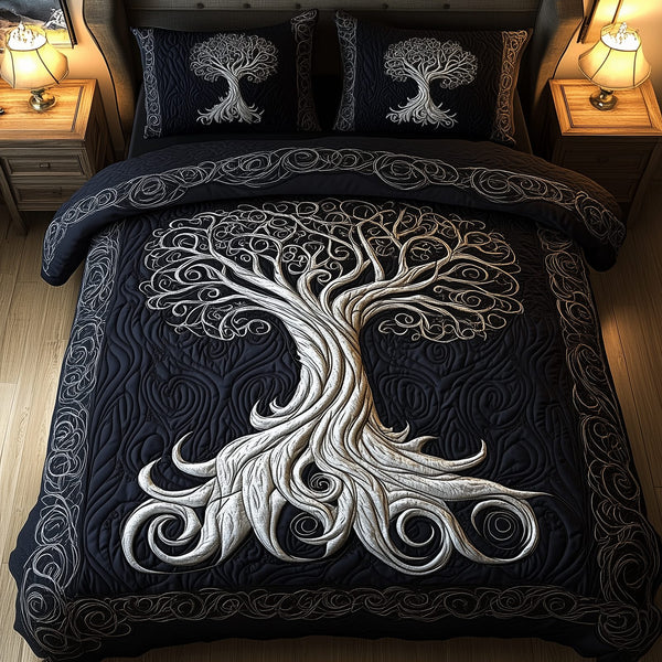 Mythic Tree of Life quilted 3-piece bedding set on a made bed with two matching pillow shams