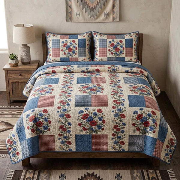 Nation Bloom quilted 3-piece bedding set on a made bed with two matching pillow shams