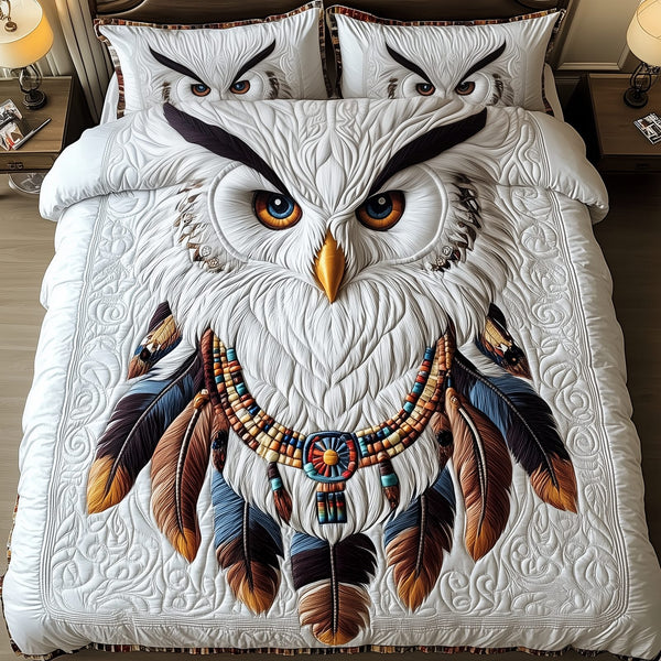Native American Owl quilted 3-piece bedding set on a made bed in a warmly lit bedroom